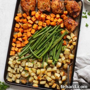 Golden Roasted Chicken and Garden Vegetables 5 overhead view of a baking sheet containing chicken thighs and veggies
