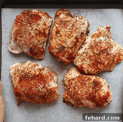 Golden Roasted Chicken and Garden Vegetables 7 overhead view of Chicken thighs in a baking sheet