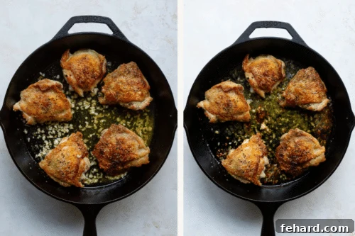 Chicken thighs searing in a cast iron skillet, skin-side down.