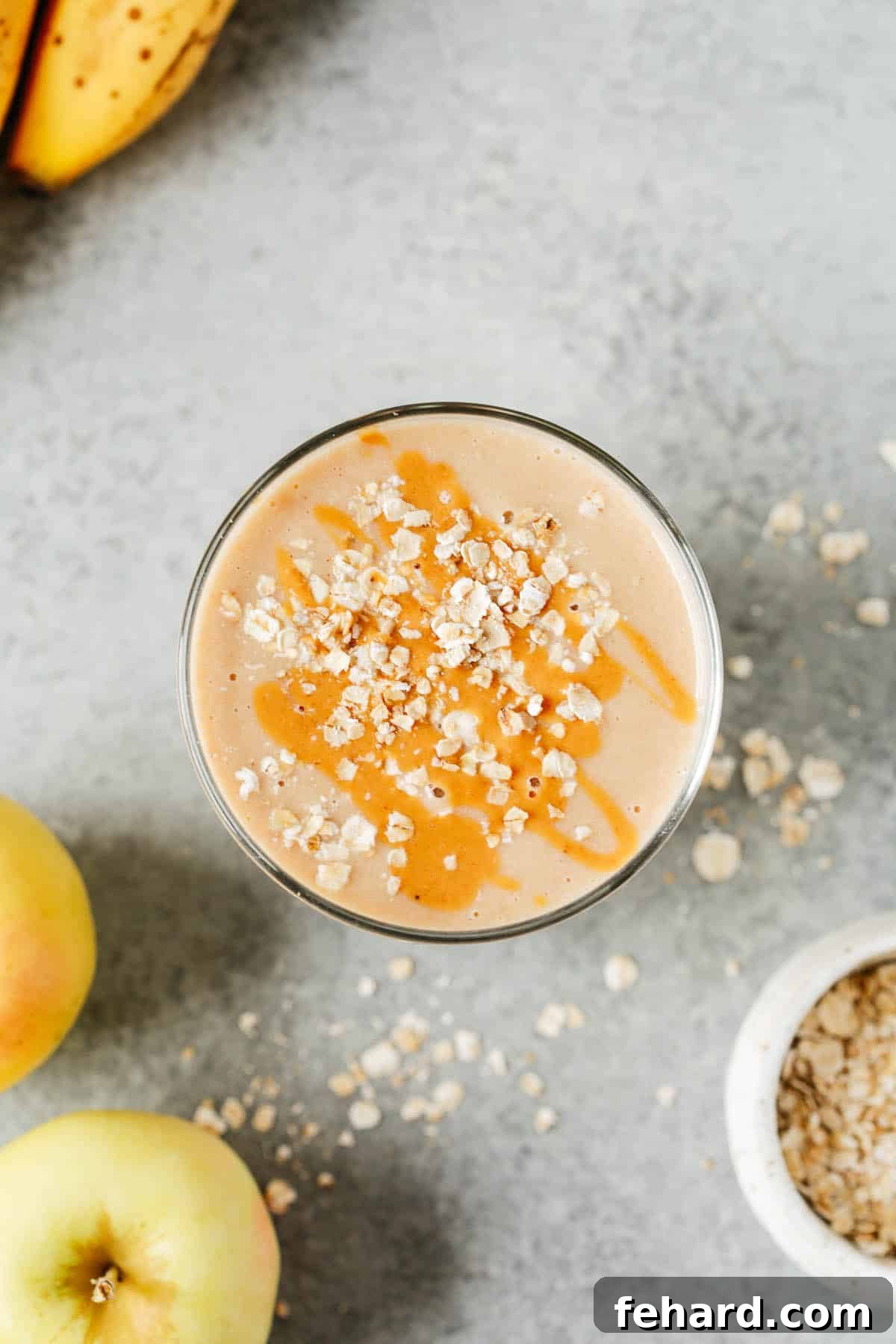 overhead view of a cup of apple smoothie