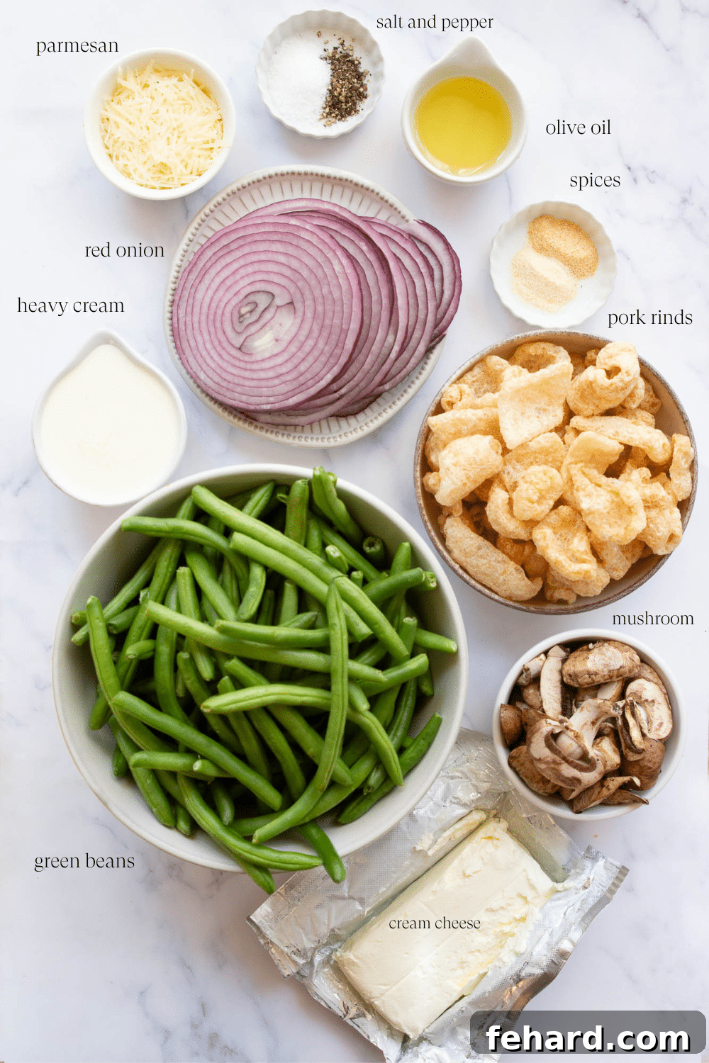 ingredients on a marble board to make green beans casserole