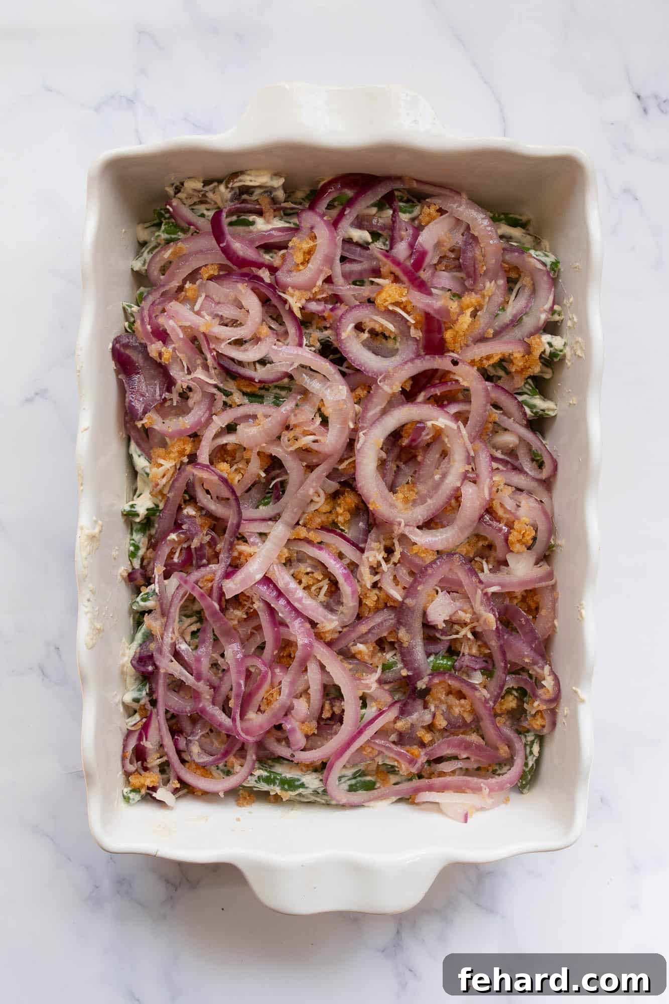 overhead green beans in a white casserole