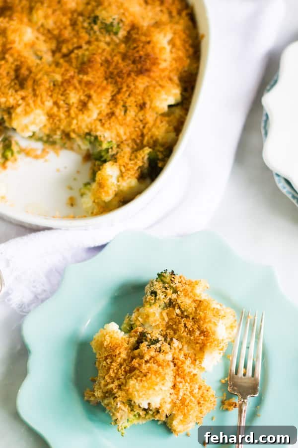 A perfect individual portion of Cheesy Broccoli-Cauliflower Bake served fresh. A beautifully plated serving of Cheesy Broccoli-Cauliflower Bake next to the full casserole dish, ready to be enjoyed.
