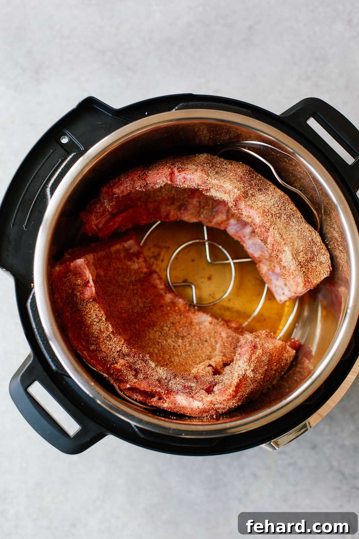 Effortlessly Tender Instant Pot Ribs 7 Set of two photos showing seasoned ribs coiled and placed upright inside the Instant Pot before cooking.