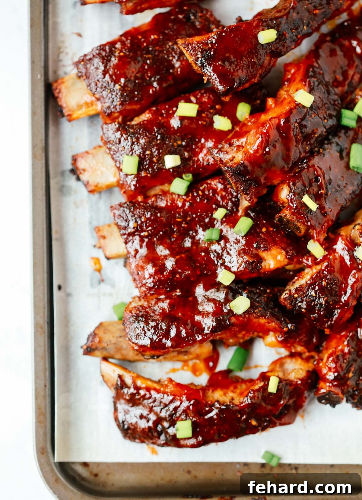 Fall-Off-The-Bone Slow Cooker Ribs 7 Close up of a rack of cooked slow cooker ribs.