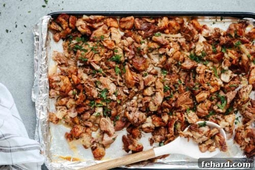 carnitas on a prepared baking sheet