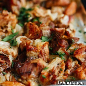 close up of carnitas on a baking sheet