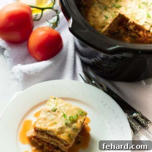 A smaller image of a slice of Slow Cooker Zucchini Lasagna on a plate.