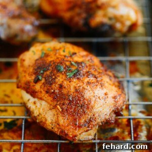 A close up of a chicken thighs on a rack