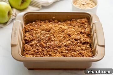 Freshly baked Apple Crisp with a perfectly golden, crunchy crumble made with oats.