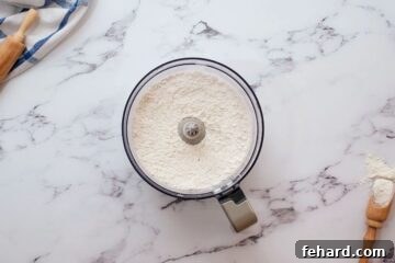 Flour and salt pulsed together in food processor.