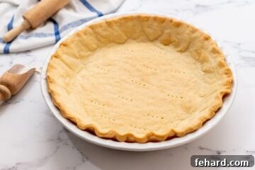 Partially baked pie crust.