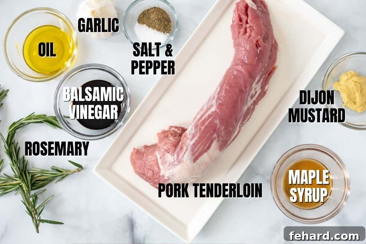 Pork tenderloin with all the ingredients for the balsamic marinade laid out on a white kitchen counter. Each ingredient, including balsamic vinegar, olive oil, maple syrup, Dijon mustard, garlic, and rosemary, is clearly visible and ready for use.