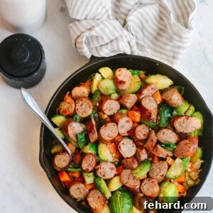 Cast iron skillet with sausage and Brussels sprouts.