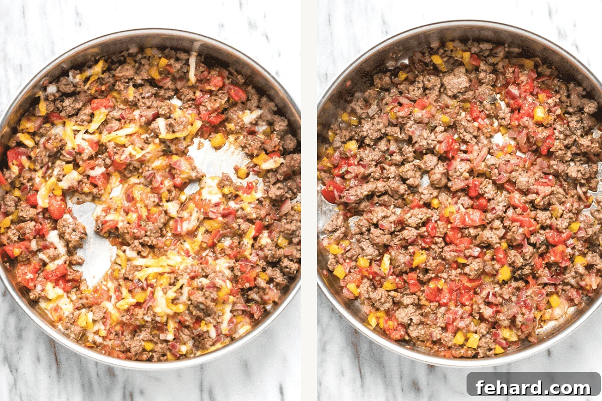 Adding diced tomato, seasonings and cheese to sautéed veggies and ground beef.