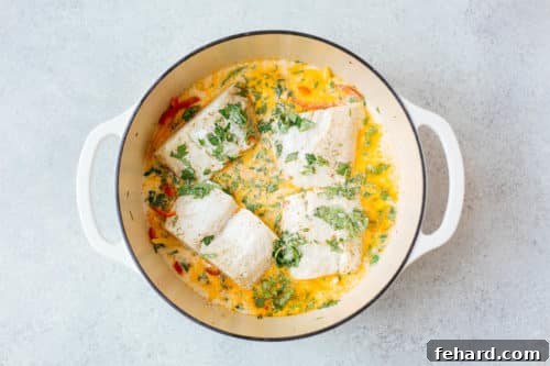 Vibrant Brazilian Fish Stew 12 overhead view of Dutch Oven containing fish stew ingredients