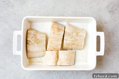 Vibrant Brazilian Fish Stew 7 overhead view of raw cod in a casserole