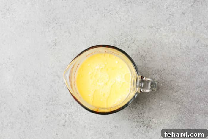 Golden Baked Cheesy Potatoes 5 heavy cream and melted butter in a cup