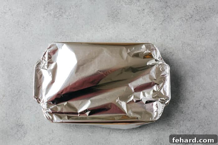 Golden Baked Cheesy Potatoes 8 casserole wrapped with foil