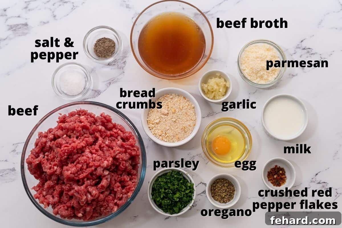 Labeled ingredients for Italian-seasoned baked meatballs arranged on a white kitchen counter.