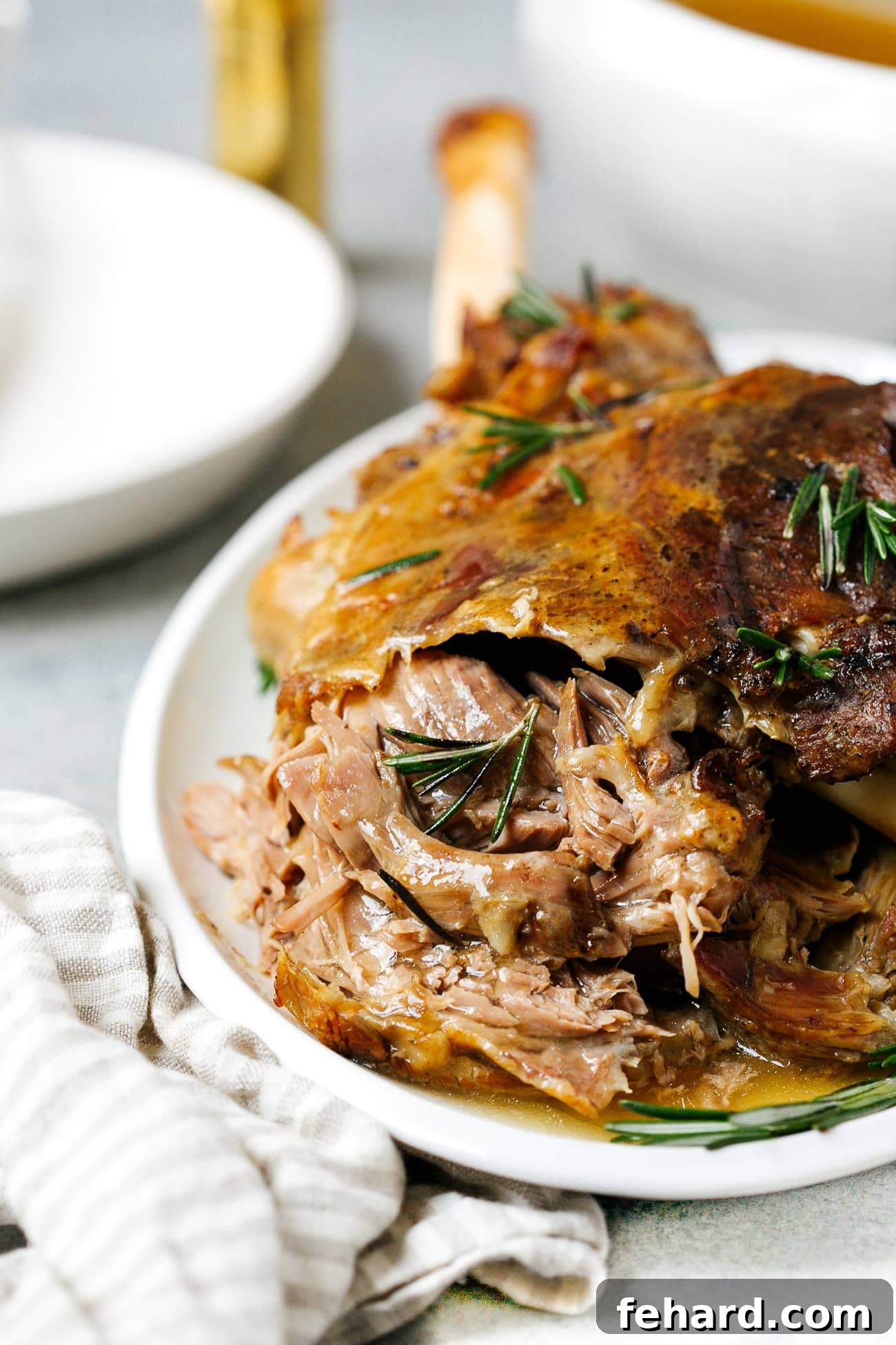 Fall-Off-The-Bone Slow Roast Lamb 2 Closeup of perfectly slow roasted leg of lamb, juicy and tender.
