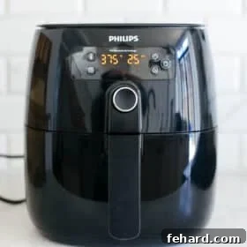 Philips Air Fryer on a kitchen marble countertop
