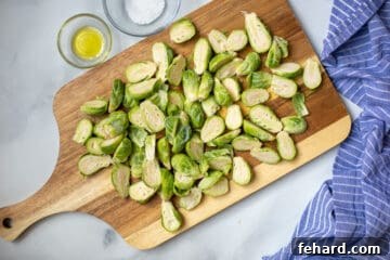 Trimmed Brussels Sprouts on cutting board.