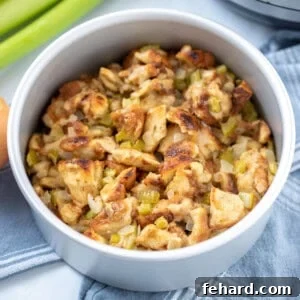 Instant Pot Stuffing in a cake pan, garnished, with the Instant Pot in the background.