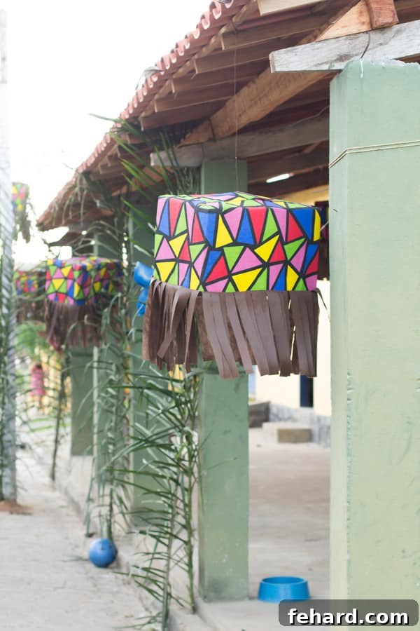 Colorful triangular flags and balloons decorating a Festa Junina celebration