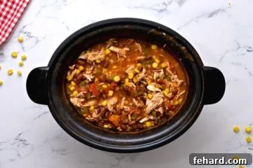 Cooked chicken in crockpot.