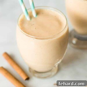 Spicy Pineapple Peach Smoothie, a delicious blend of tropical fruits and warming spices.