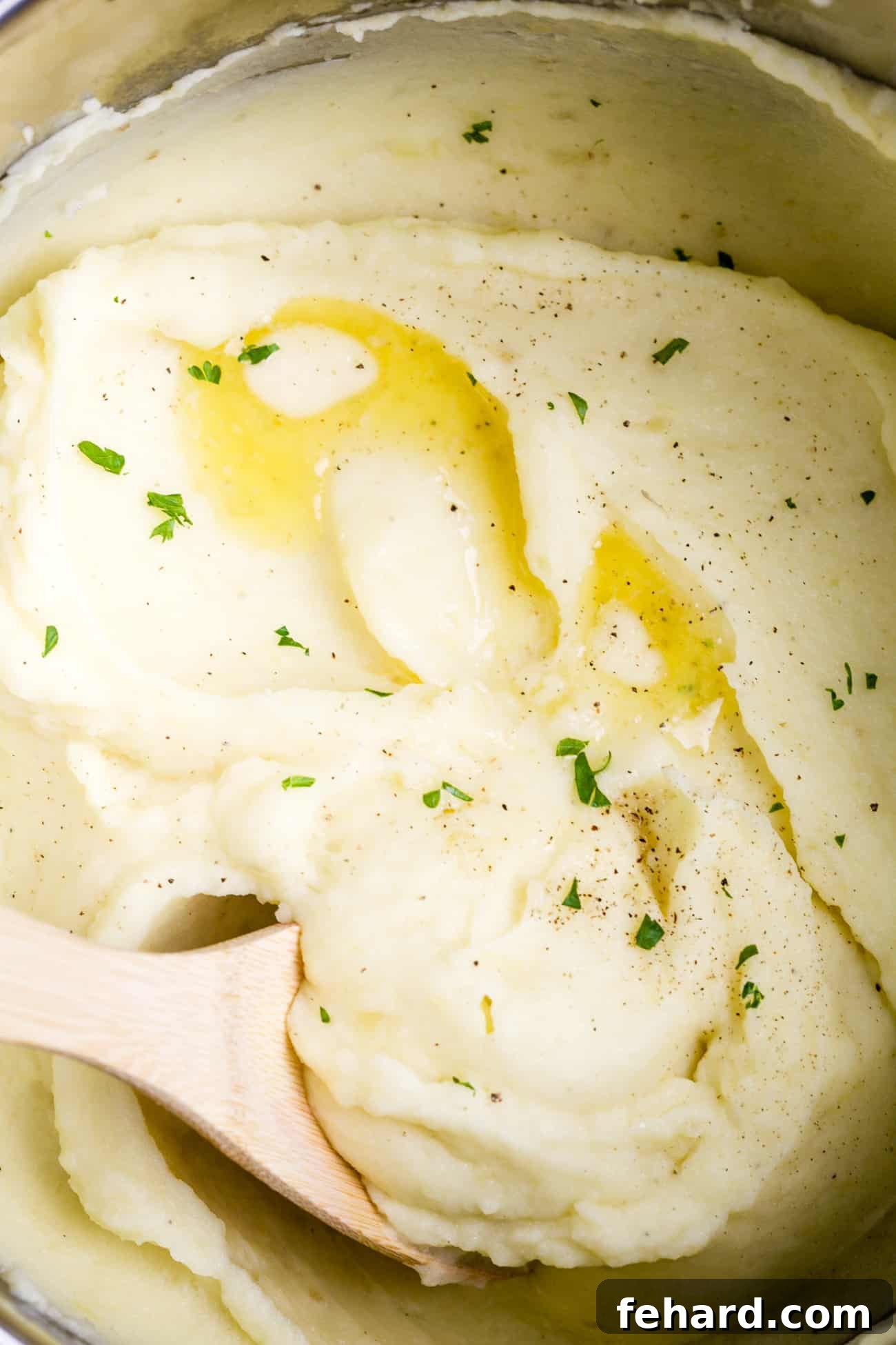 Close-up view of creamy mashed potatoes in an Instant Pot, ready to be served.