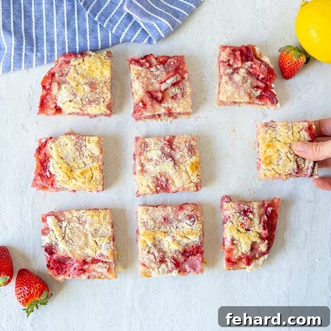 Strawberry Crumb Bar Recipe Slices Freshly baked Strawberry Pie Bars cut into nine perfect squares, ready for serving.