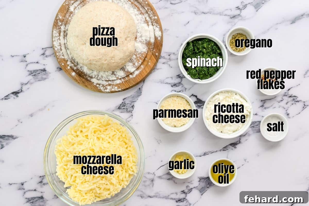 White Pizza with Spinach Ingredients for spinach pizza labeled on the counter, including pizza dough, spinach, ricotta, mozzarella, and garlic.