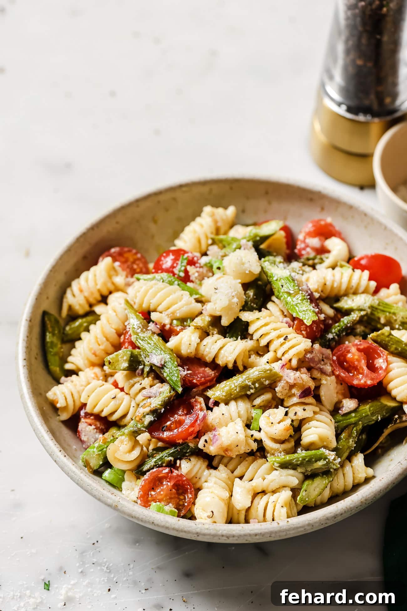 Vibrant Asparagus Pasta Salad 7 A beautifully presented bowl of asparagus pasta salad, highlighting the fresh ingredients and inviting textures.