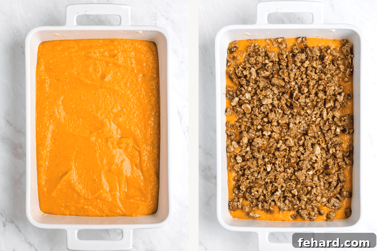 Photo of the assembled sweet potato casserole in a baking dish, with the smooth sweet potato base covered uniformly by the golden pecan streusel topping, ready for the oven.