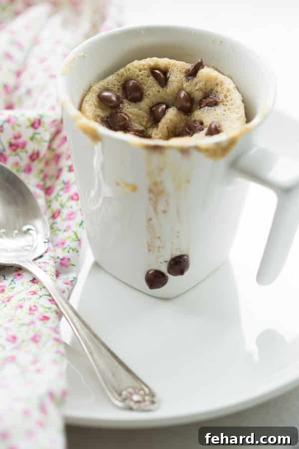 Delicious Gluten-free Mug Cake On-the-Go in a mason jar, ready for a busy day.