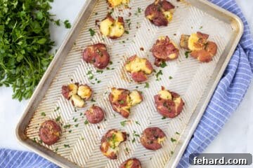 Garlic Butter Smashed Potatoes on sheet pan.