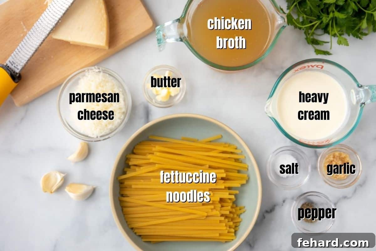 Instant Pot Fettuccine Alfredo Recipe Ingredients Neatly arranged ingredients for Instant Pot Fettuccine Alfredo, including fettuccine noodles, broth, heavy cream, parmesan, butter, garlic, salt, and pepper, ready for cooking.