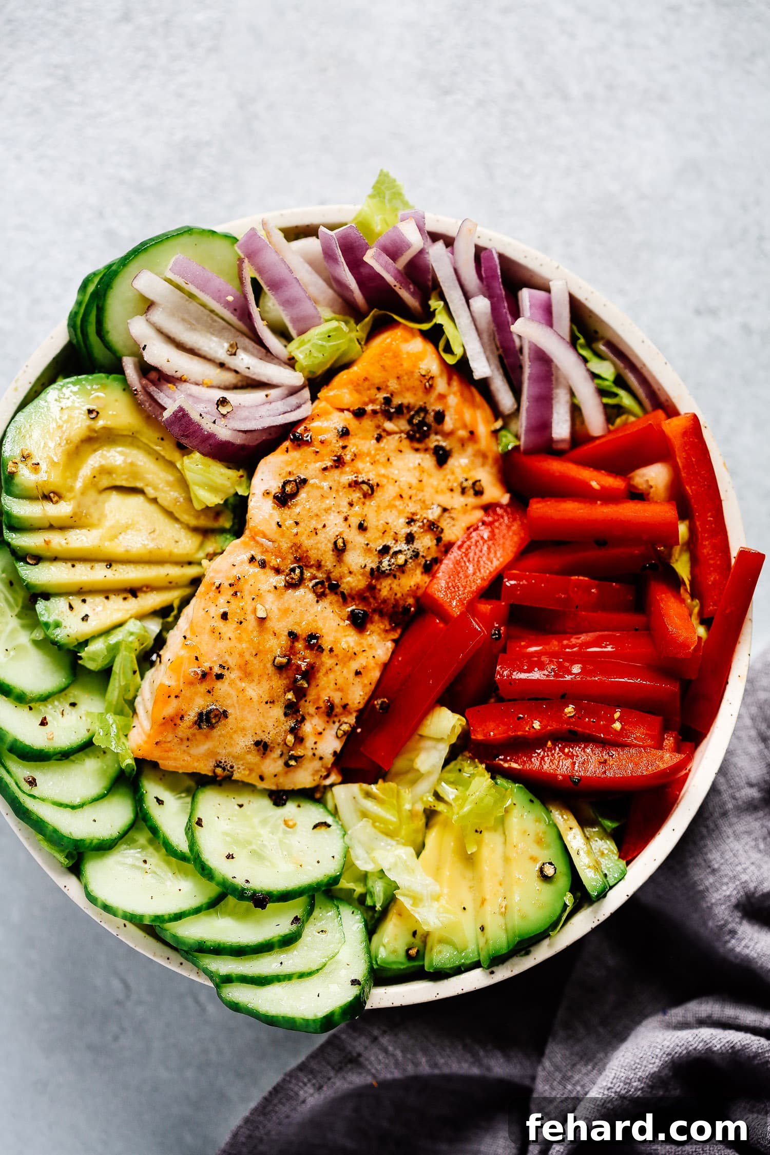 Flavorful Gluten-Free Dinners 8 An overhead view of a colorful salmon salad bowl, a refreshing gluten-free dinner.