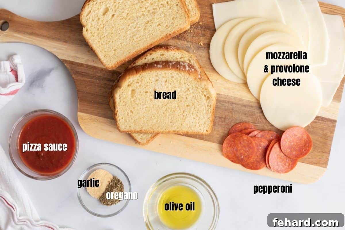 Pepperoni Grilled Cheese Recipe Ingredients for pizza grilled cheese labeled on counter.