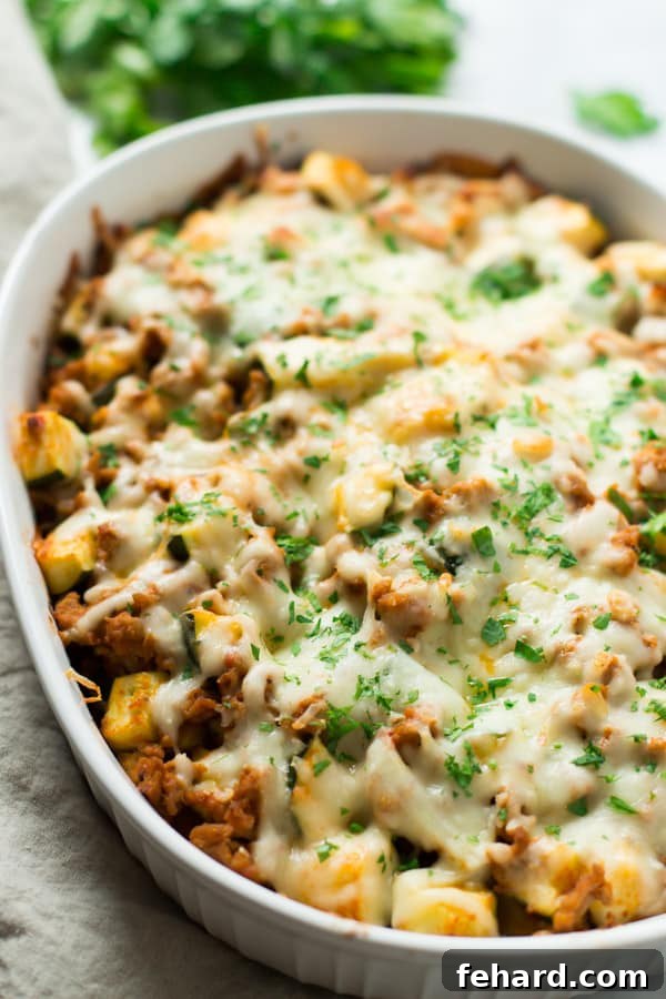 Sweet Potato Zucchini Casserole - A healthy, gluten-free, and easy one-pan meal with protein and fresh vegetables. Flavorful Sweet Potato Zucchini Casserole with lean ground turkey, perfect for a healthy weeknight meal.