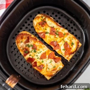 French Bread Pizza with melted cheese and pepperoni, ready to eat.
