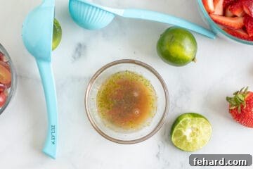 Honey mixed with lime juice and lime zest in small bowl.