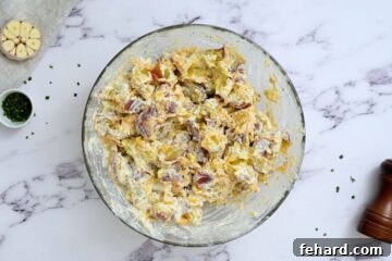 Red potato salad dressed with homemade ranch dressing.