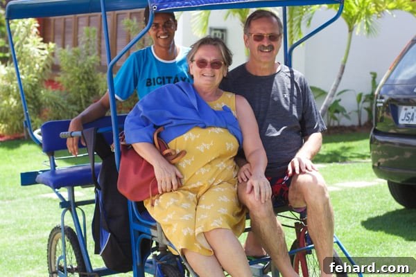 A heartwarming family photograph capturing smiles and togetherness amidst the beauty of Praia do Forte.