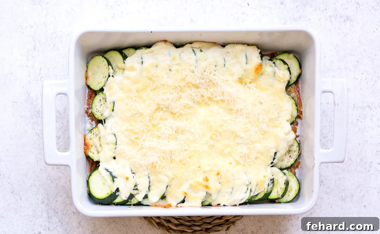 Golden Zucchini Gratin 7 Parmesan cheese added to baked casserole before returning to the oven for broiling.