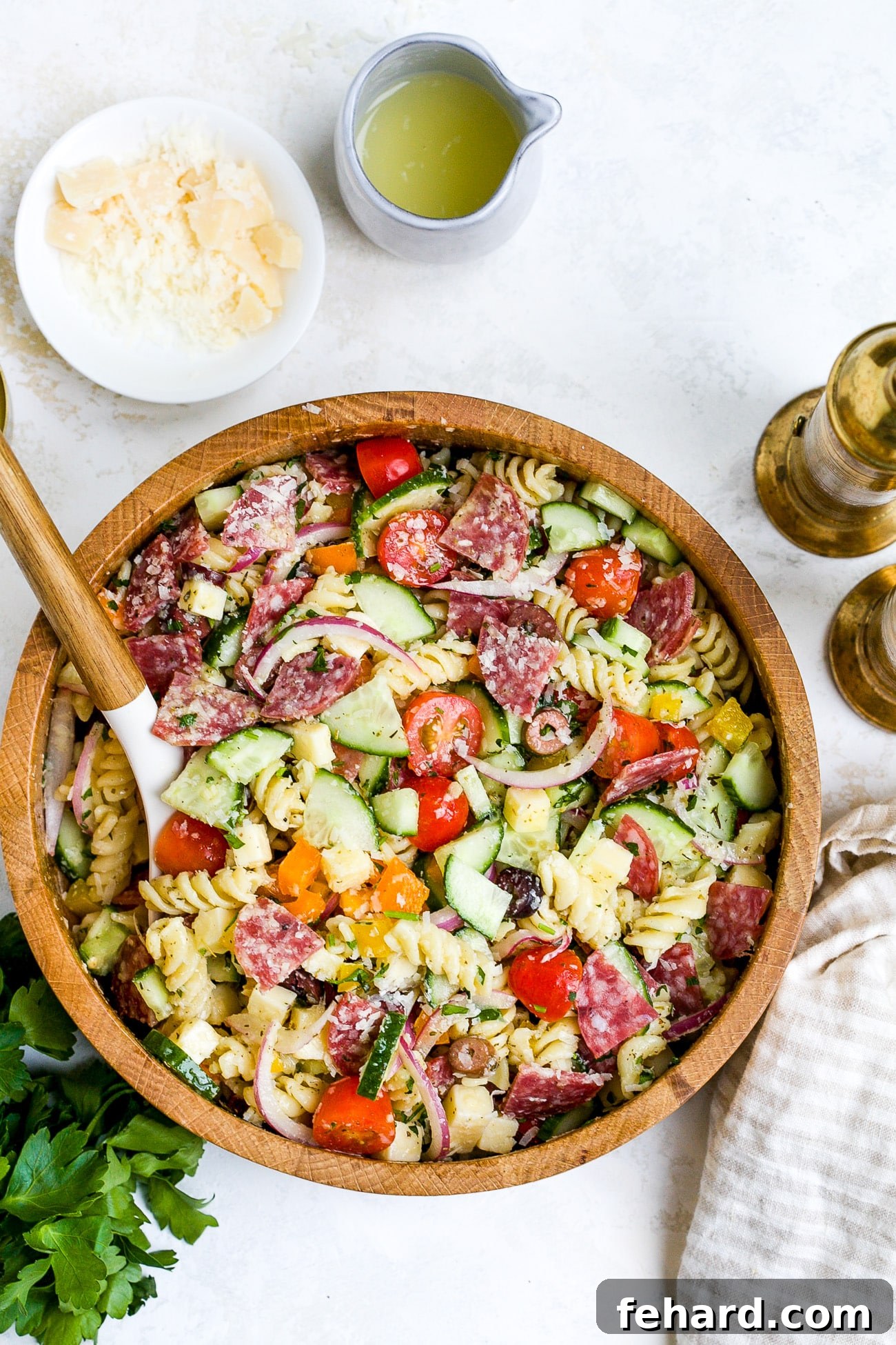 Overhead view of Italian Pasta Salad Recipe in a large wooden bowl. 