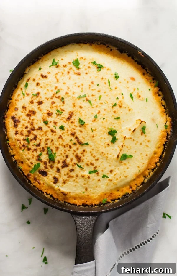 mashed-cauliflower-shepherds-pie- Mashed Cauliflower Shepherd’s Pie - Give a healthy spin in your traditional shepherd's pie recipe by making it with mashed cauliflower. It's very filling, low-carb, gluten-free, paleo-friendly and the most important very DELICIOUS! Mashed Cauliflower Shepherd’s Pie Primavera Kitchen Recipe
