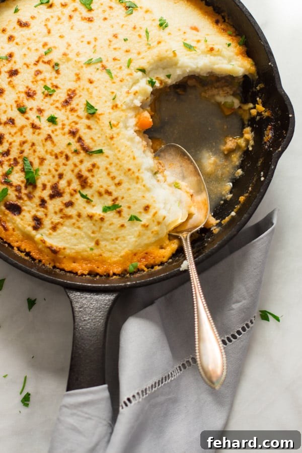 mashed-cauliflower-shepherds-pie- Mashed Cauliflower Shepherd’s Pie - Give a healthy spin in your traditional shepherd's pie recipe by making it with mashed cauliflower. It's very filling, low-carb, gluten-free, paleo-friendly and the most important very DELICIOUS! Mashed Cauliflower Shepherd’s Pie Primavera Kitchen Recipe